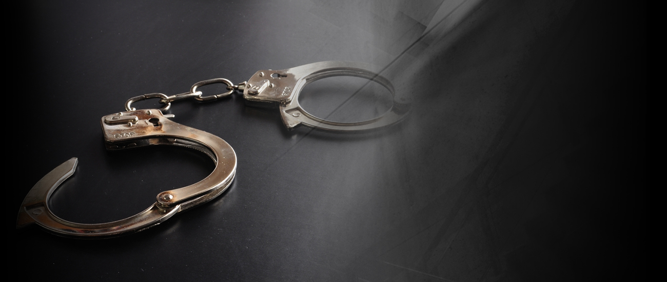 Photograph of handcuffs.